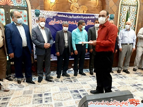 گزارش تصویری/بزرگداشت شهادت شهید صارمی و روز خبرنگار در بروجرد