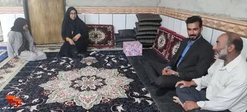 دیدار رئیس بنیاد شهید شهرستان حاجی‌آباد با خانواده شهید و جانبازان
